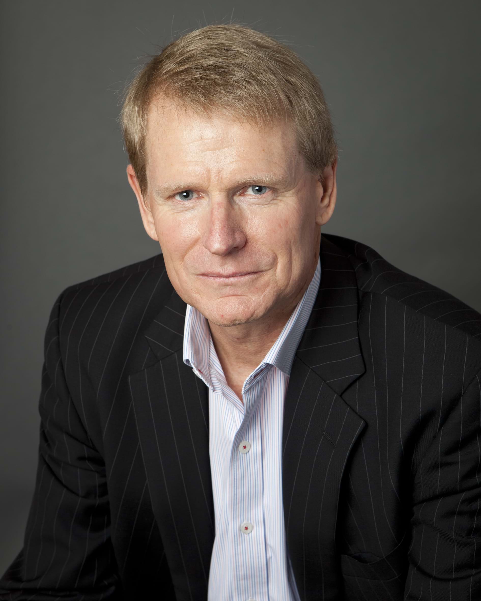 Corporate Portrait Photography | Melbourne Photography | Individual head and shoulder corporate photo of man on grey background