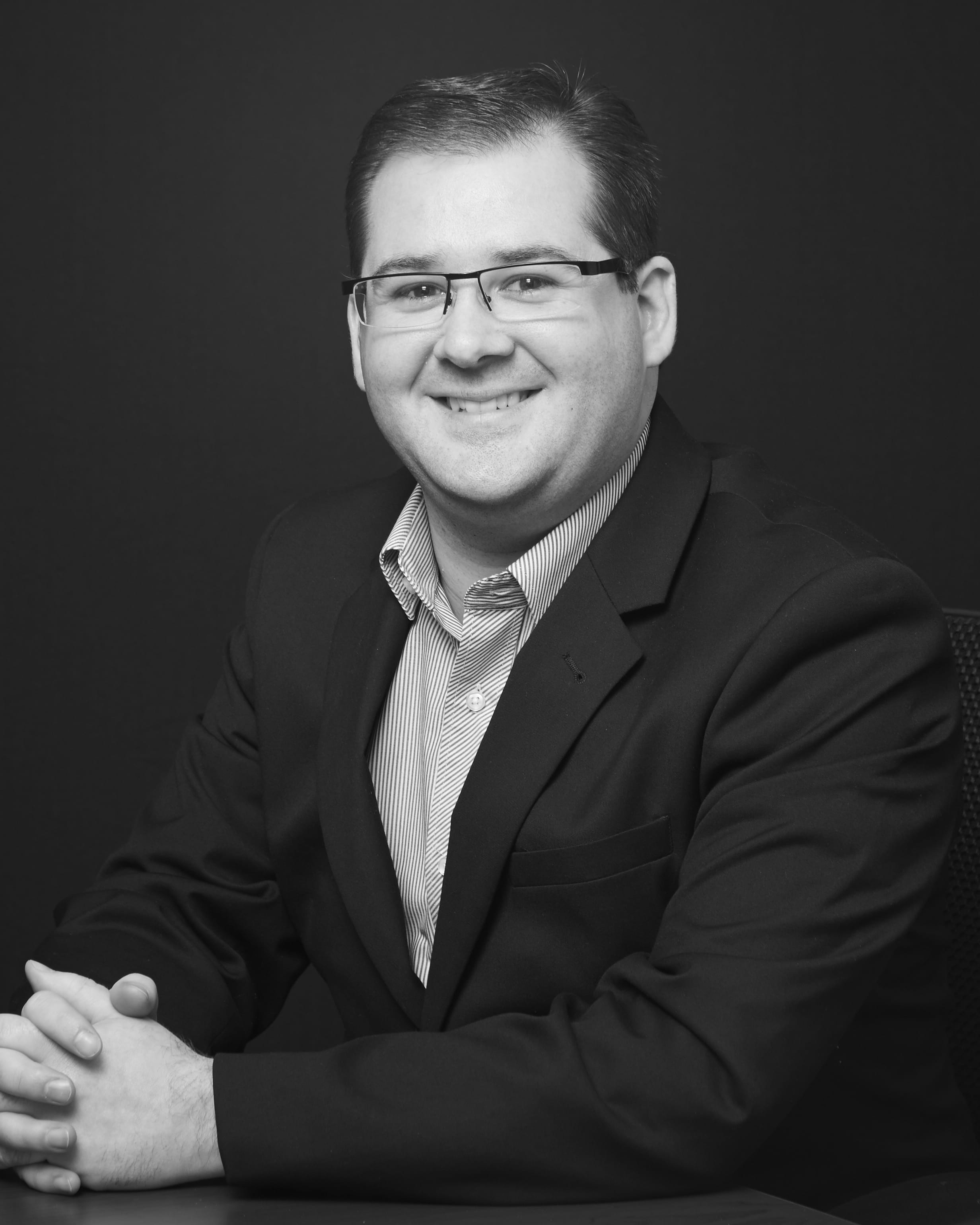 Corporate Portrait Photography | Melbourne Photography | Individual head and shoulder corporate photo of man on grey background