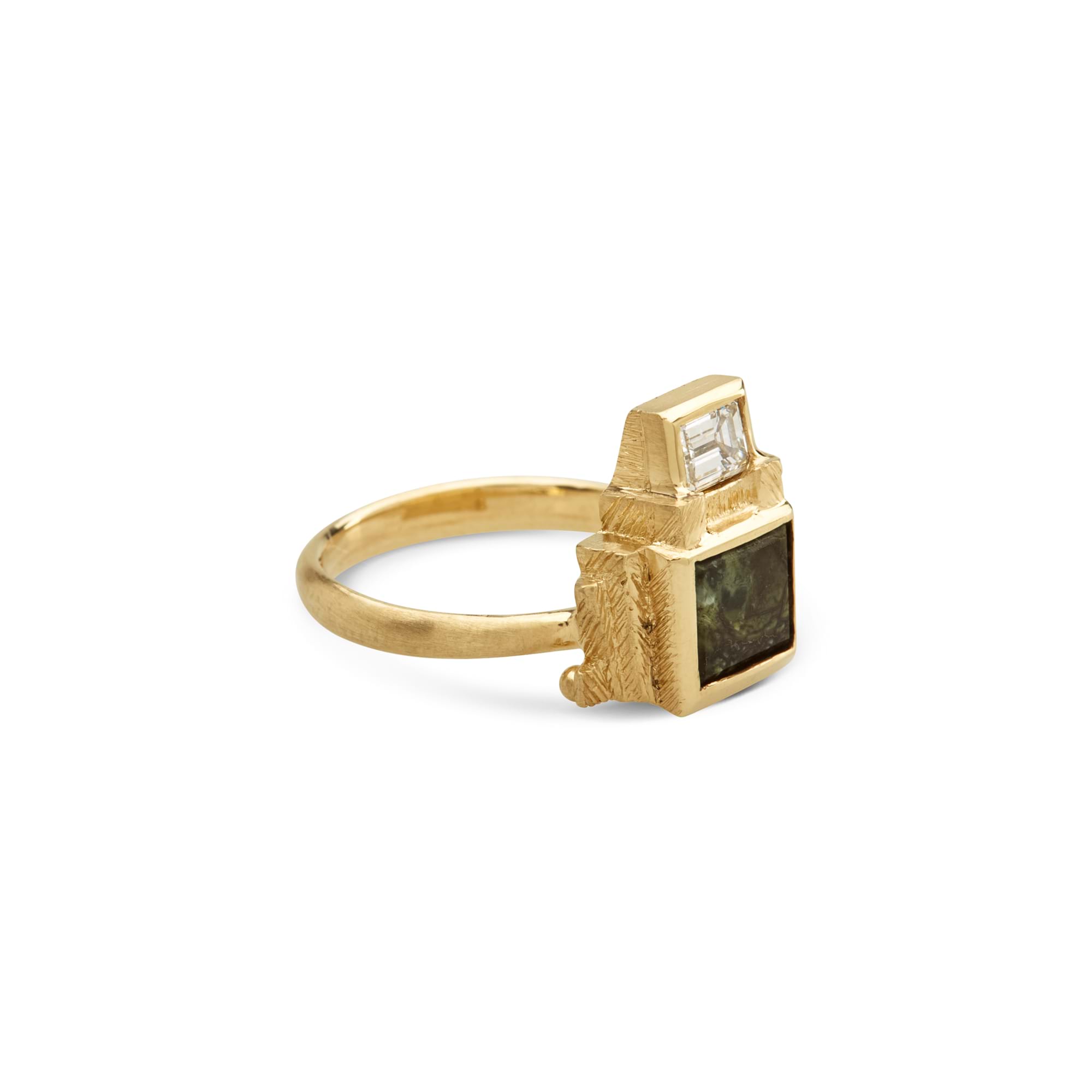 Product Photography Jewellery | Melbourne Photography | Close up of gold and dark emerald ring on white background